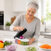 38dc42e0-7744-4905-a6b2-cf56e0c71e6f arthritis person using vegetable chopper and mandolin slicer
