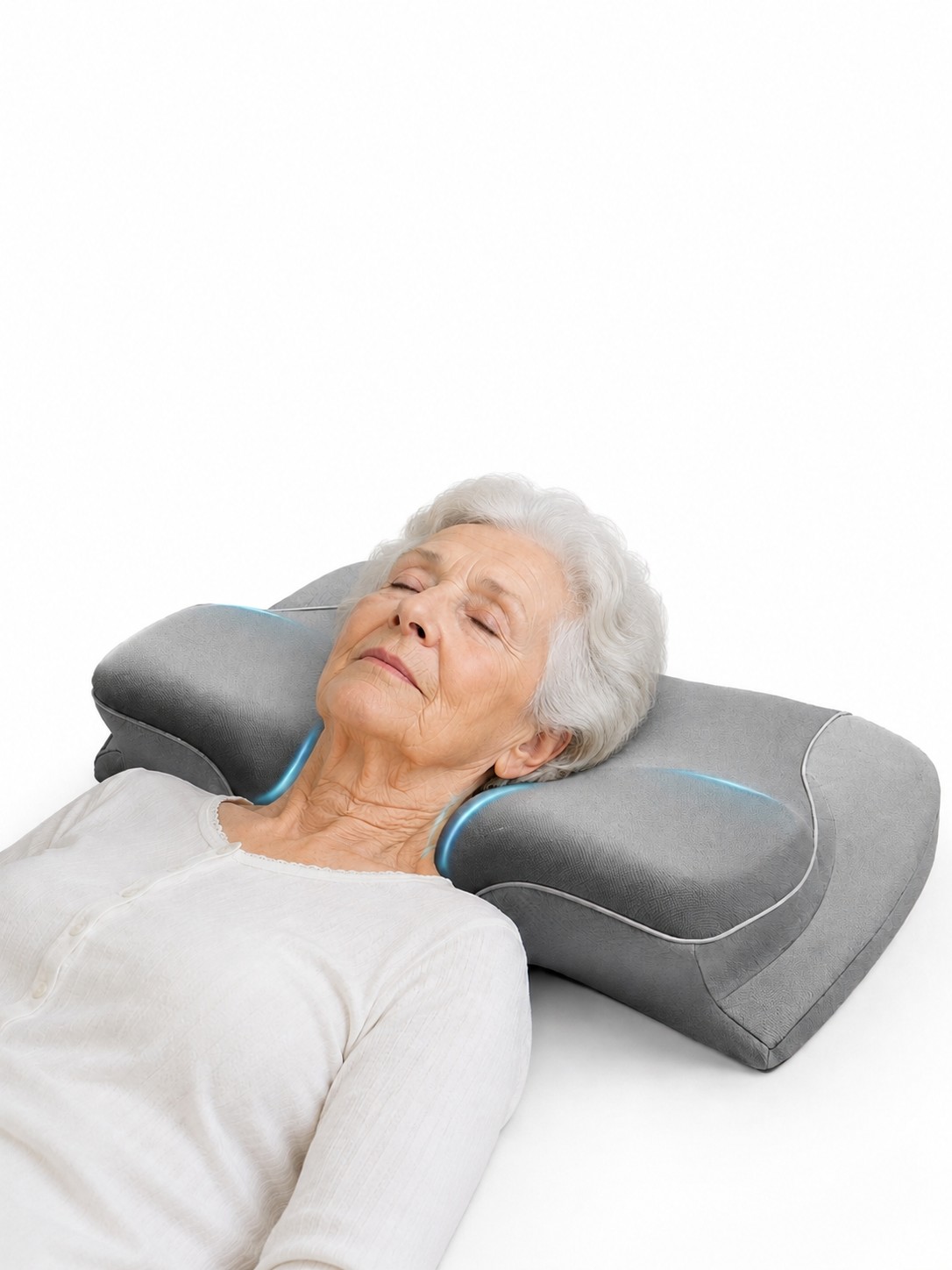 Elderly woman resting on a contoured orthopedic neck support pillow